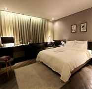 Phòng ngủ 5 Londoner Hotel