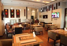 Restaurant 4 Magnum Hotel Suites