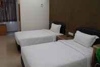 Kamar Tidur Hotel Grand Court Inn - Sungai Besar