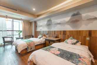 Kamar Tidur 4 Guilin Oasis Inn