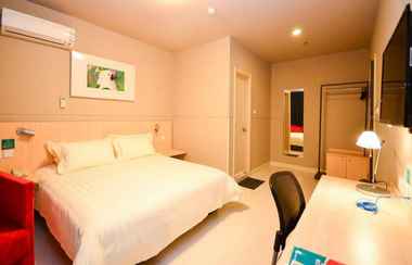 Bedroom 2 Jinjiang Inn Select Jiaxing Wanda Plaza