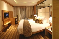 Bedroom Grand Notting Hills Hotel And Resorts