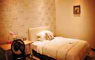 Bilik Tidur 4 J HOTEL GUANGZHOU UNIVERSITY TOWN