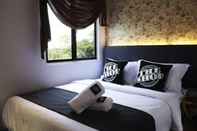 Kamar Tidur The Shop Hotel