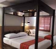 Kamar Tidur 3 Mariposa Budget Hotel (Drive Inn)