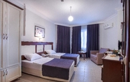 Kamar Tidur 3 Kaila City Hotel Ex K House Hotel