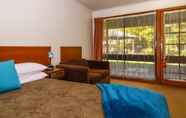 Kamar Tidur 4 River Country Inn - Adults Only