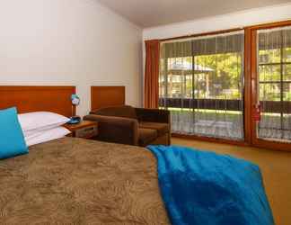 Kamar Tidur 2 River Country Inn - Adults Only