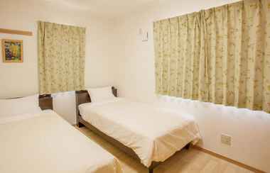 Bilik Tidur 2 Kariyushi Condominium Resort Nago Las Flores