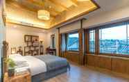 Kamar Tidur 4 LIJIANG RUNJING SCENIC HOTEL