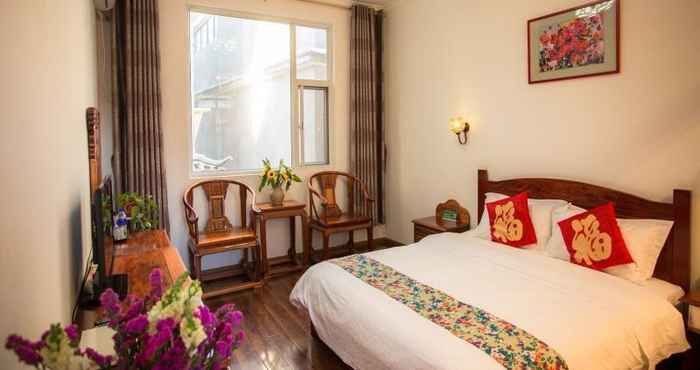 Kamar Tidur Shell Dali Old City East Gate Hotel