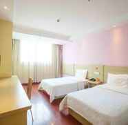 Kamar Tidur 5 7 DAYS INN ZHONGSHAN SHIQI DAXIN NORTH RAILWAY STA