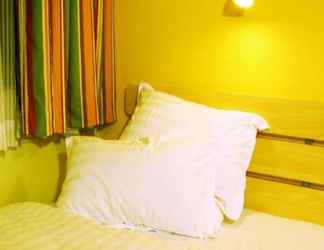 Bedroom 2 7Days Inn Guanghan Zhongyang Xincheng