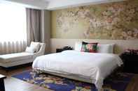 Kamar Tidur EASTONE VEGETARIAN CULTURE HOTEL