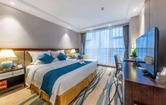 ห้องนอน 5 Days Hotel by Wyndham Chongqing Keyuan