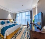 ห้องนอน 5 Days Hotel by Wyndham Chongqing Keyuan