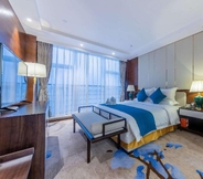 ห้องนอน 7 Days Hotel by Wyndham Chongqing Keyuan