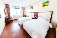 ห้องนอน GreenTree Inn (Zhangjiagang Jingang Town, RT-Mart)