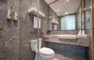 Phòng tắm bên trong 7 Days Hotel By Wyndham Yinxiang Wuyishan