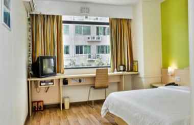 Bedroom 2 7 Days Inn Guangzhou Huadu Jianshebei Road Branch