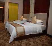 Bedroom 2 Shishi Kingsa Hotel