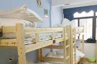 Kamar Tidur Enjoy International Youth Hostel