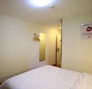 Bedroom 2 7 Days Inn Zhengzhou Train Station West Square Bra