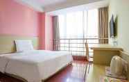 Kamar Tidur 4 7 Days Inn Jinjiang Sunshine Time Square