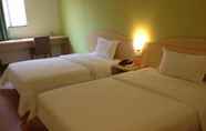 Kamar Tidur 5 7 Days Inn Jinjiang Sunshine Time Square