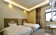 Bilik Tidur 4 Shell Hotel Shanghai Baoshan Hutai Road Branch