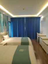 Bedroom 4 PAI Hotels·Xichang Railway Station