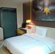 Bedroom 2 7 Days Inn Yiyang Taojiang Bus Station Branch