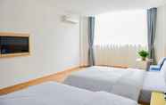 Kamar Tidur 6 7 Days Inn Qingnian Road Station Branch