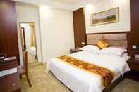 ห้องนอน GreenTree Inn Shenzhen Kengzi Town Express Hotel