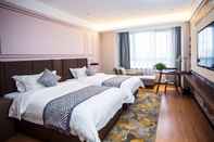 ห้องนอน Gem Hotel Luoyang Longmen High Speed Railway Stati