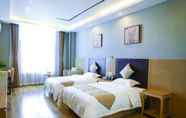 Bedroom 2 Greentree Alliance Hotel Mang City Tuanjie Street