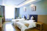 Bedroom Greentree Alliance Hotel Mang City Tuanjie Street
