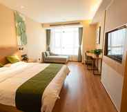 Bedroom 2 Greettree Inn Jieshou Renmin Road Guozhen Plaza