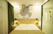 Bedroom 6 Vatica Suzhou Xiaoxian Longhu Road Hotel