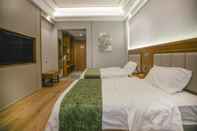 ห้องนอน Green Tree Inn Jiuquan Century Plaza Hotel