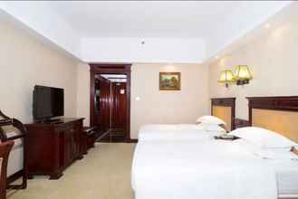 Kamar Tidur 4 Mingchen International Hotel