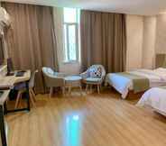 Kamar Tidur 4 Greentree Inn Cixi Suntang North Road Hotel