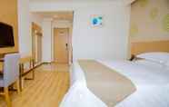 Bedroom 2 GreenTree Inn (Nantong Zhangzhishan, Deli Plaza)