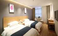 Kamar Tidur 2 Shell Xinzheng Airport Port Huaxia Avenue Hotel