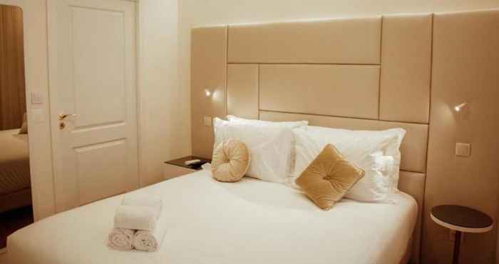 Bedroom Le Premier Lisbon Suites