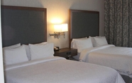 Bedroom 6 Pratt Inn & Suites