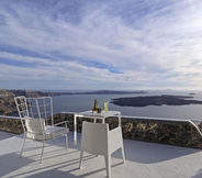 Kamar Tidur 5 Katikies Chromata Santorini - The Leading Hotels o