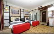 Kamar Tidur 4 Jiang Yue Ming Shang Hotel