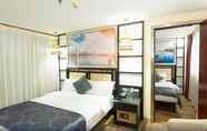 Kamar Tidur 3 Jiang Yue Ming Shang Hotel