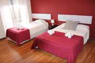 Bedroom Guesthouse RSA by Portugalferias